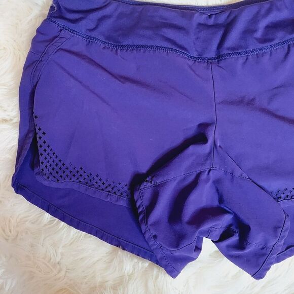 Athleta laser cutout hem purple 3" running shorts - Picture 10 of 10